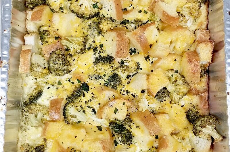 Cheesy broccoli casserole for a crowd, view in the pan of the completed recipe