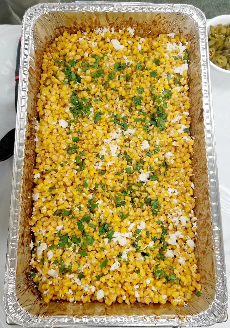 Mexican Street Corn casserole for a crowd in an aluminum hotel pan