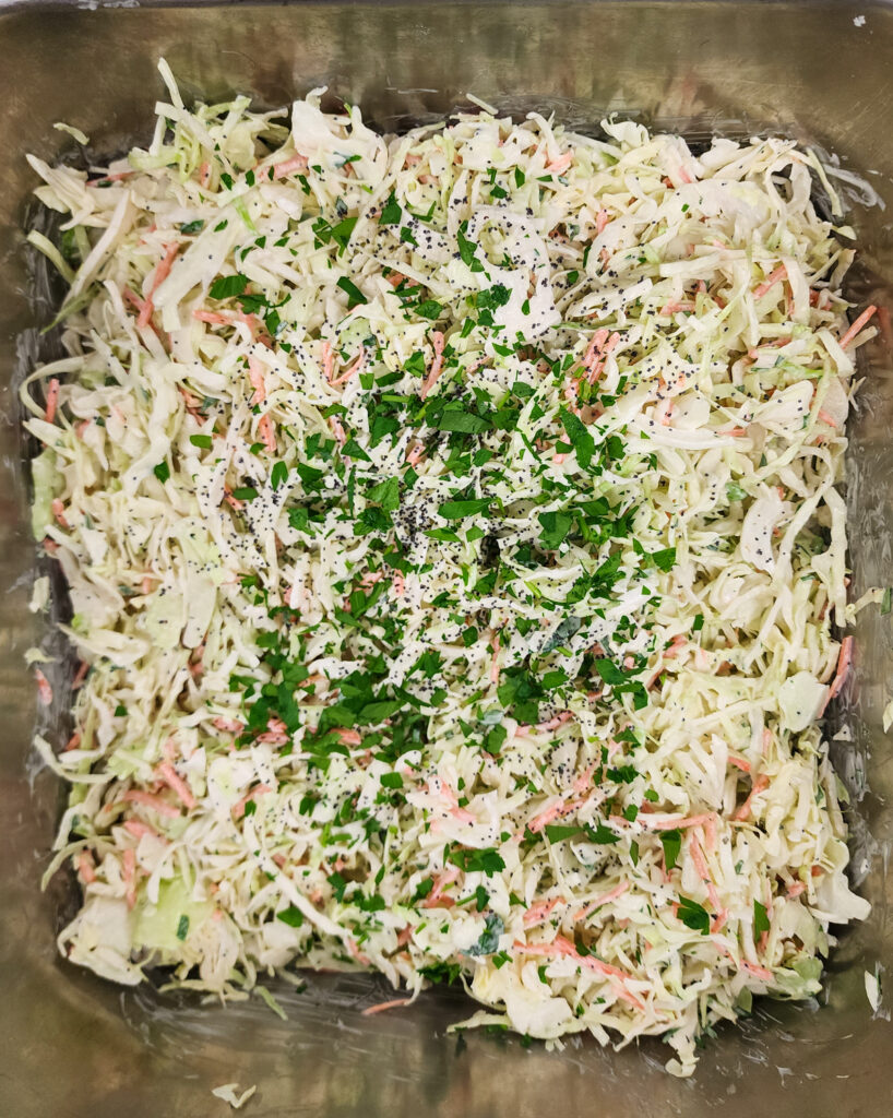 coleslaw in metal bin