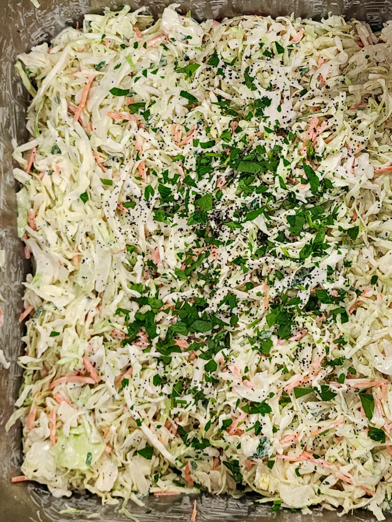 coleslaw in metal bin