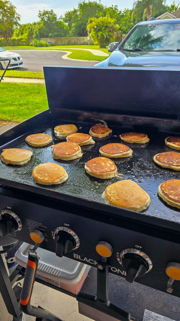 pancakes cooking on blackstone griddle