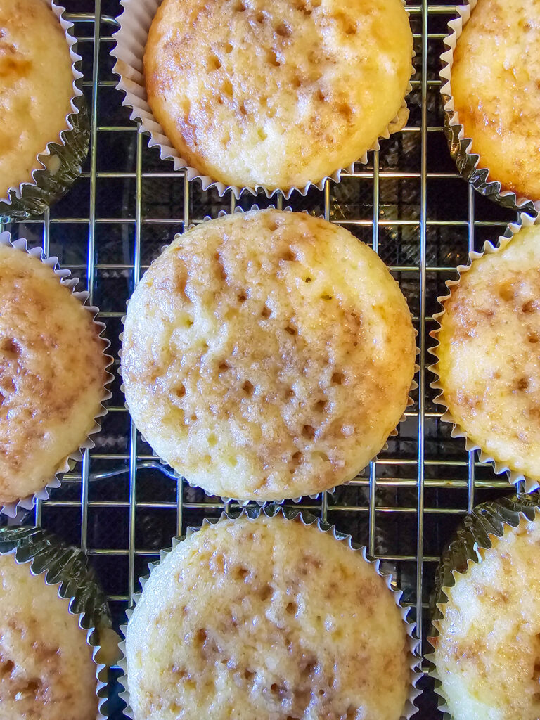 top down view onto cupcake showing fork holes after pricking