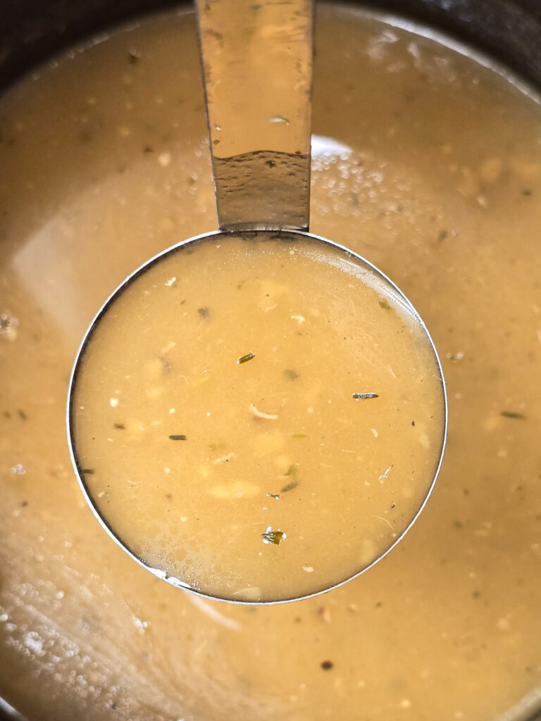 ladle scooping gravy