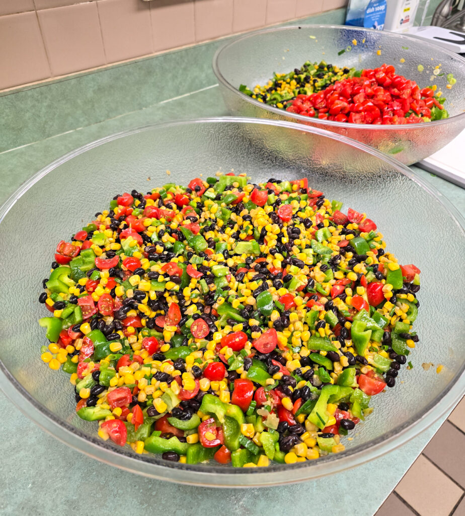 combined chopped veggies, corn, and black beans in large bowl